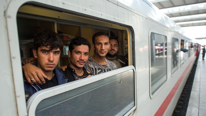 Migranti vo vlaku - ilustračné foto.