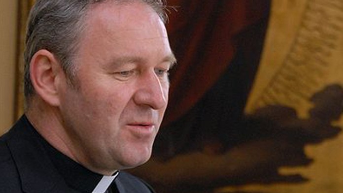 Na telo, Arcibiskup Róbert Bezák