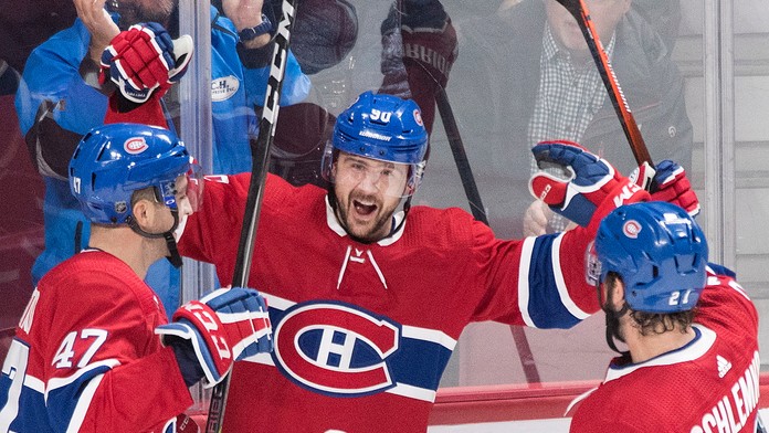 Zľava Kenny Agostino, Tomáš Tatar a David Schlemko z Montréalu oslavujú gól proti NY Rangers.