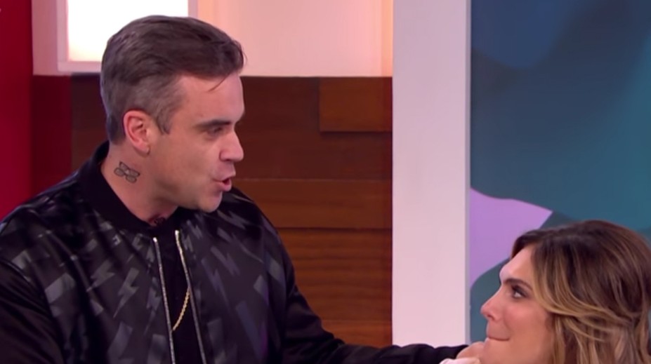 Šok pre Robbieho Williamsa v priamom prenose. Manželkine reči o sexe ho zaskočili