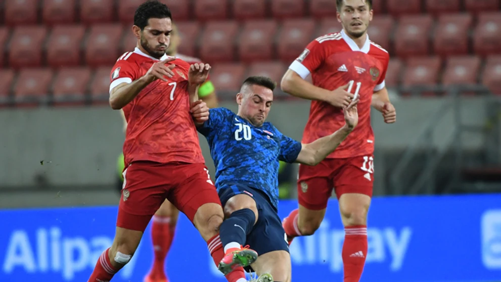 Magomed Ozdojev (vľavo), Rifat Žemaletdinov (vpravo) a Róbert Mak.