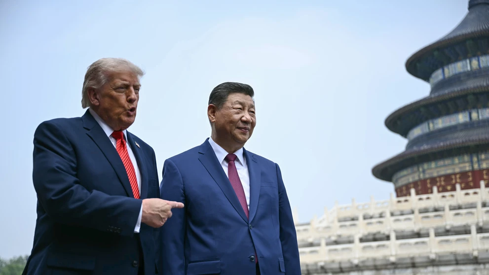 Americký prezident Donald Trump (vľavo) a čínsky prezident Si Ťin-pching počas návštevy chrámu Oltár Nebies.
