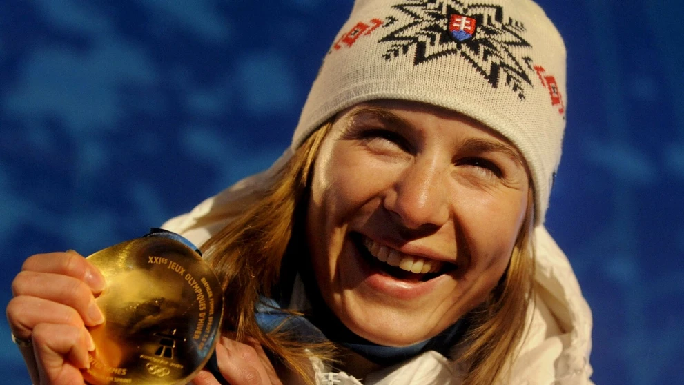 Na snímke slovenskí bratia Pavol (vpravo) a Peter Hochschornerovci s víťazným gestom v cieli  C2 15. augusta 2008 na OH v Peking