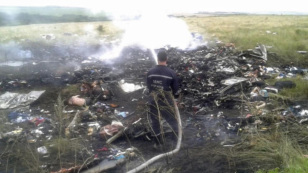 Trosky malajzijského Boeningu 777 pri ukrajinsko-ruských hraniciach.