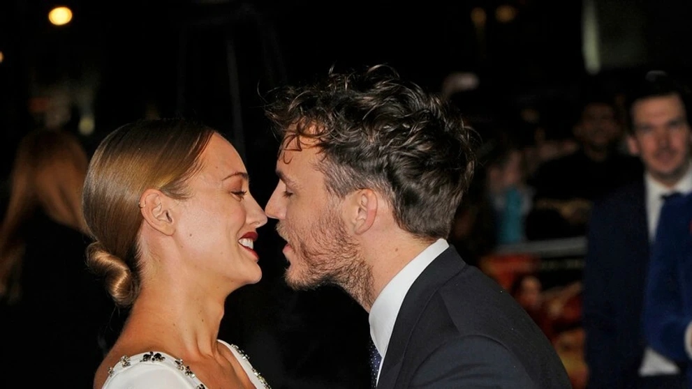 Sam Claflin s manželkou