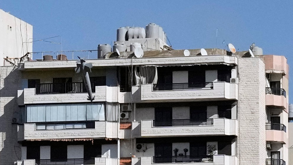 Fotograf odfotil izraelskú raketu pred nárazom do budovy v Bejrúte.