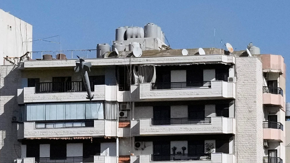 Fotograf odfotil izraelskú raketu pred nárazom do budovy v Bejrúte.