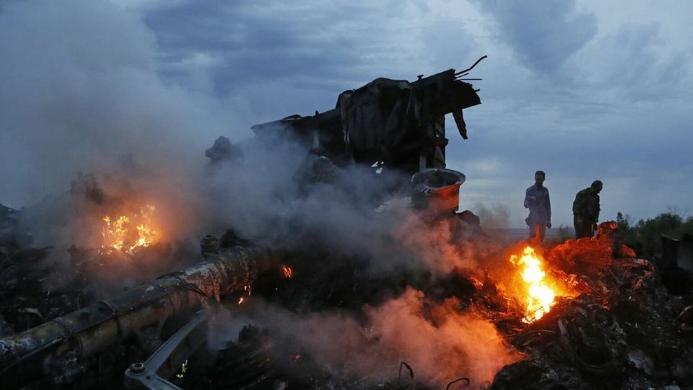 Trosky havarovaného malajzijského lietadla