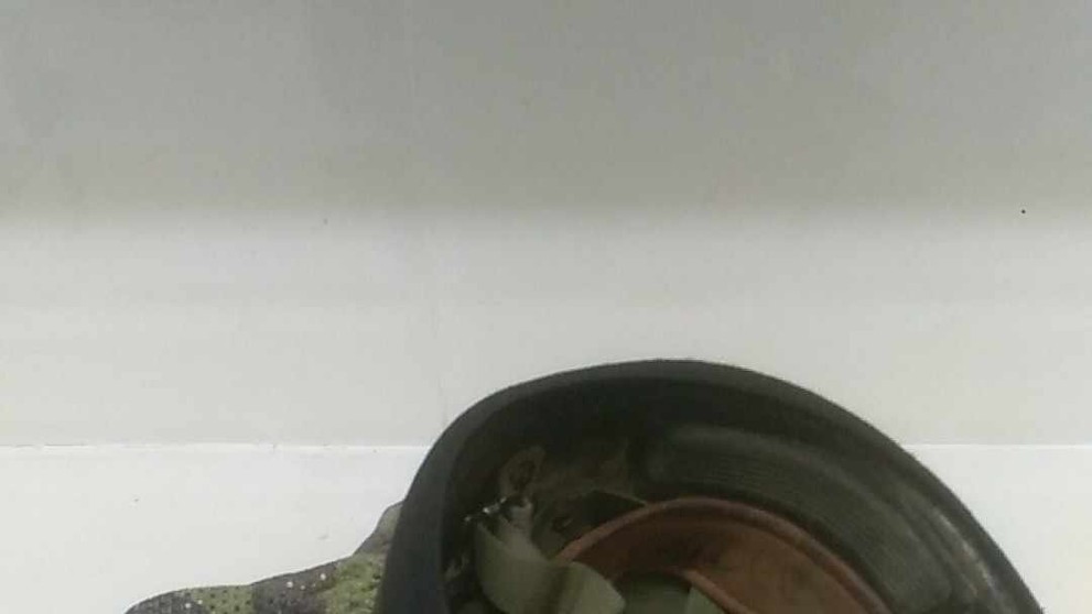 Micnefet nasadený na prilbe.