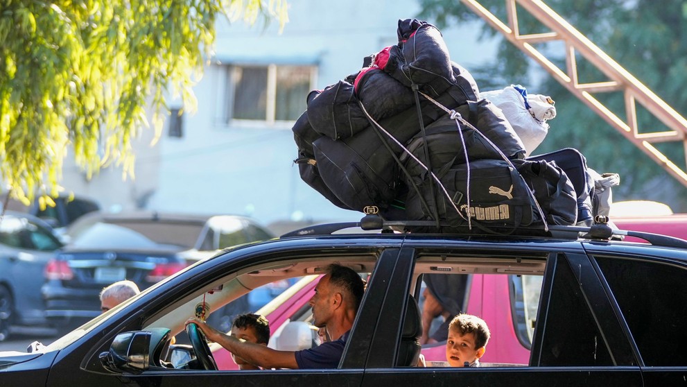 Ľudia z Bejrútu utekajú 