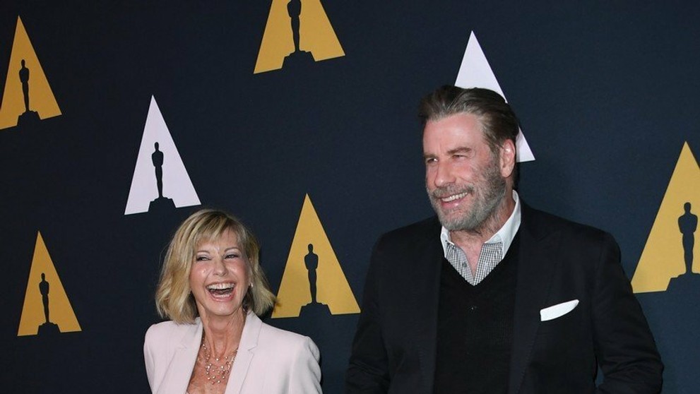 Olivia Newton-John ako Sandy a John Travolta ako Danny