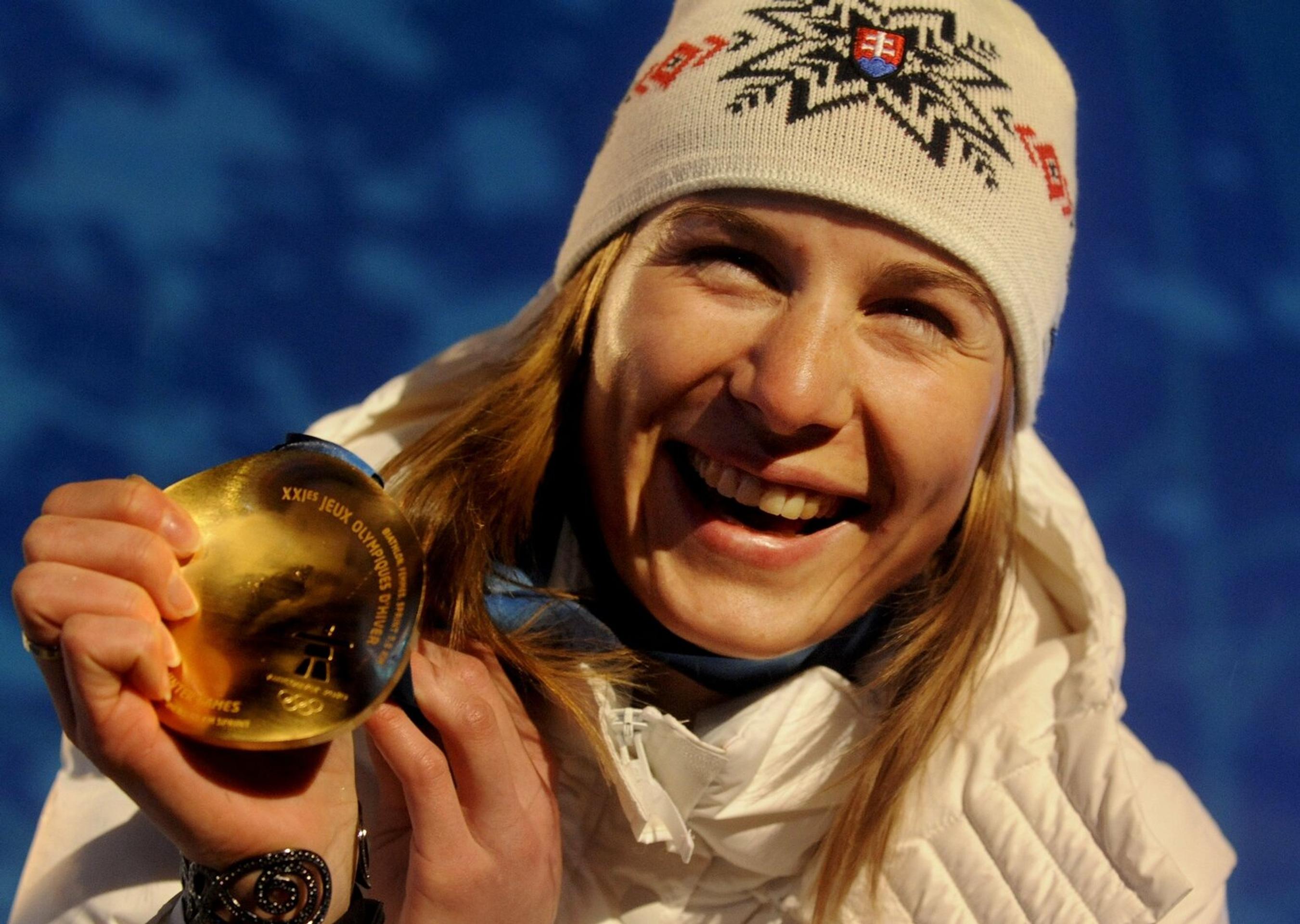 Na snímke slovenskí bratia Pavol (vpravo) a Peter Hochschornerovci s víťazným gestom v cieli  C2 15. augusta 2008 na OH v Peking