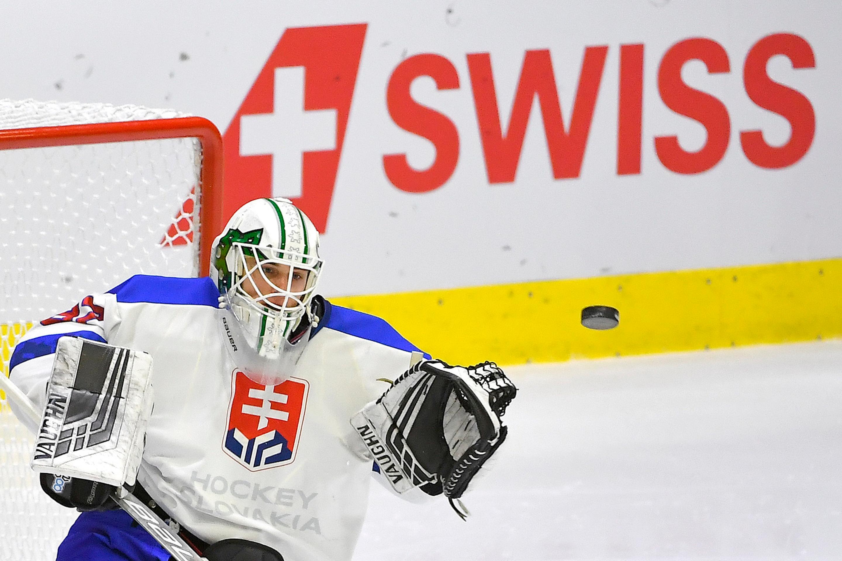 Andrej Košarišťan v dueli proti Olympijskému tímu Ruska na Švajčiarskom pohári.