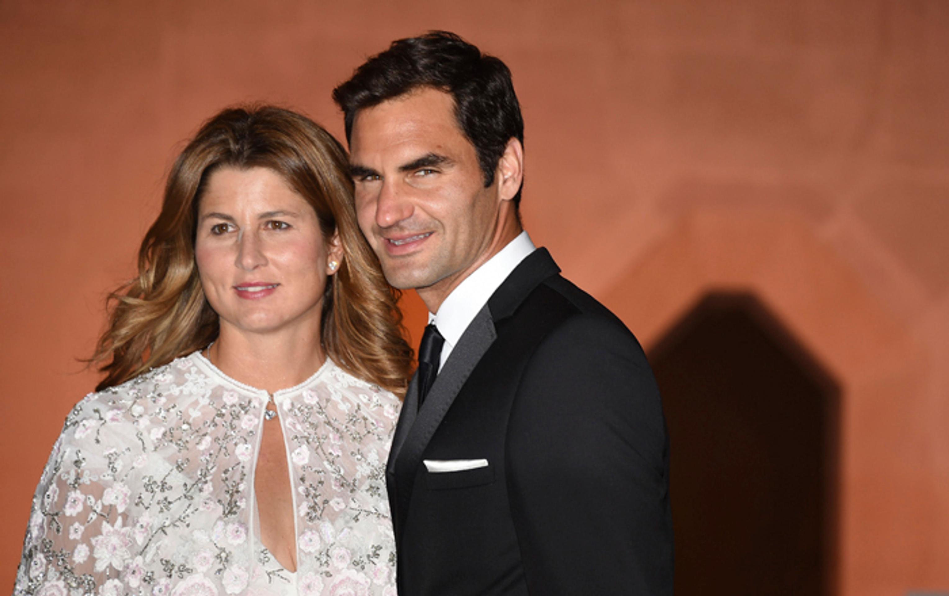 Mirka a Roger Federerovci na večierku pre wimbledonských víťazov.